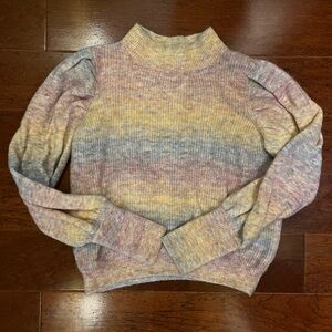 Woman’s sweater junior size XL fits more like a medium